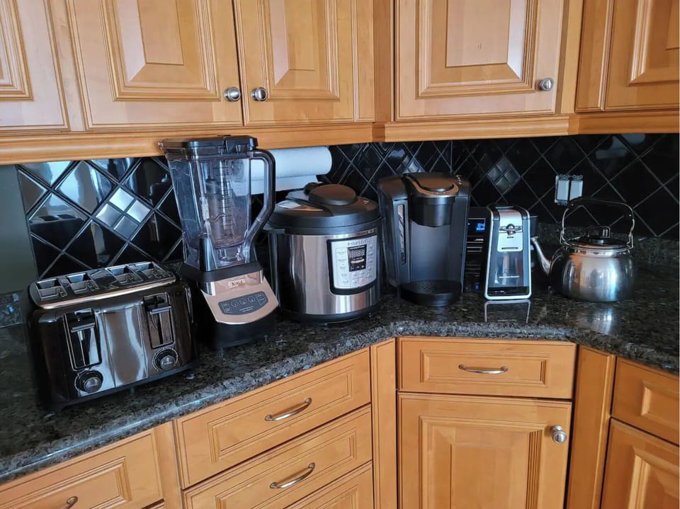 Blender, toaster, InstaPot, coffee maker, kettle and electric can opener. 
