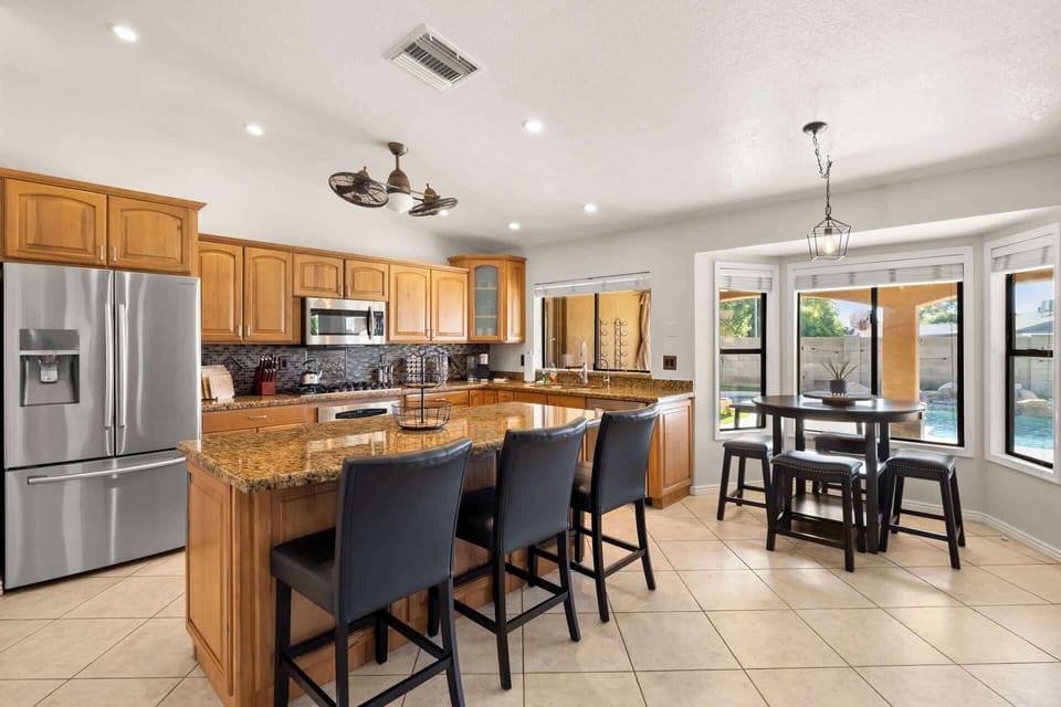 Great island and countertop sit up dining.