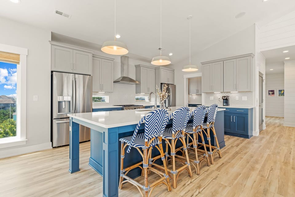 Kitchen with Bar Stool Seating on Third Level