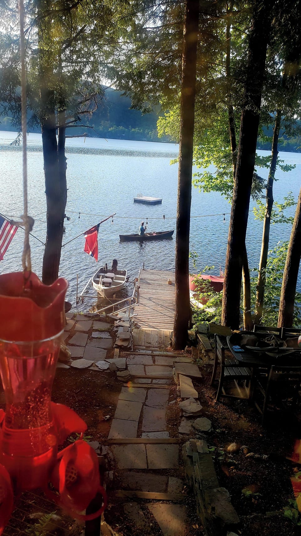 swimming platform and canoe available for use.