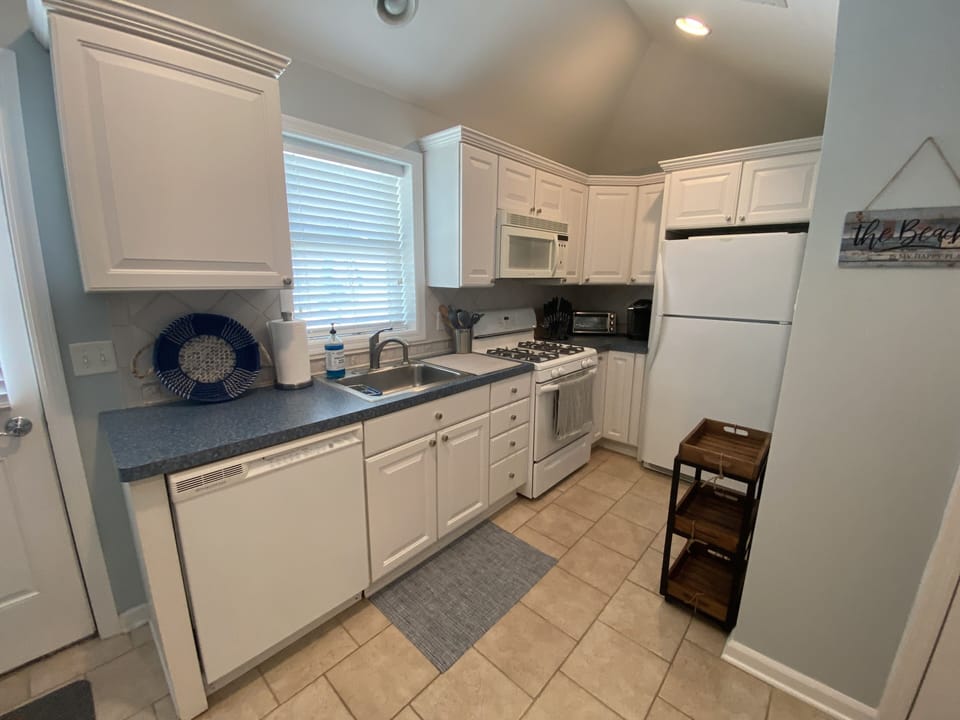 fully functional kitchen including dishwasher and microwave