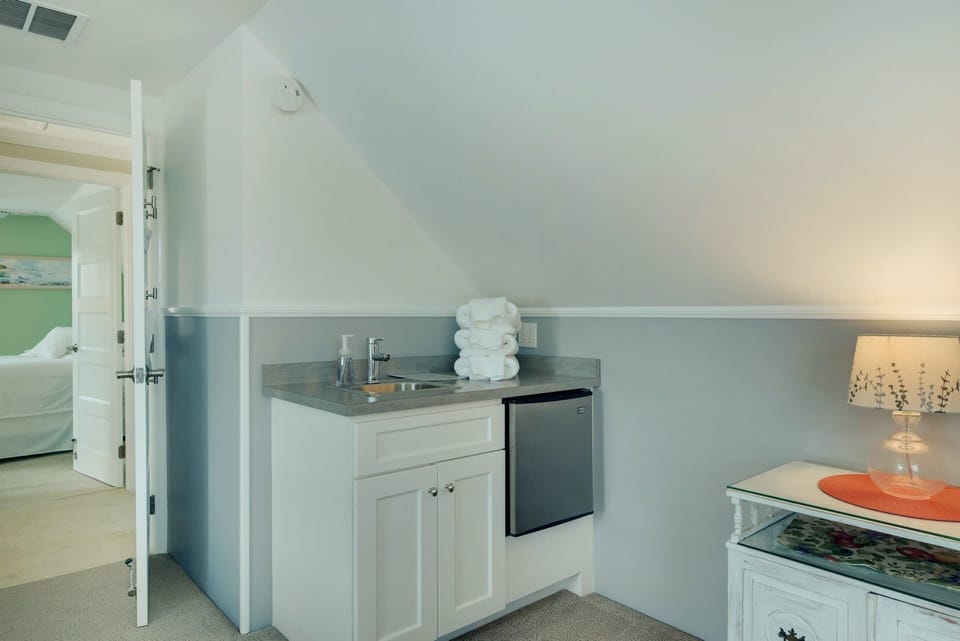 BEDROOM - 2nd-Fl South.  Queen + Twin beds with efficiency sink