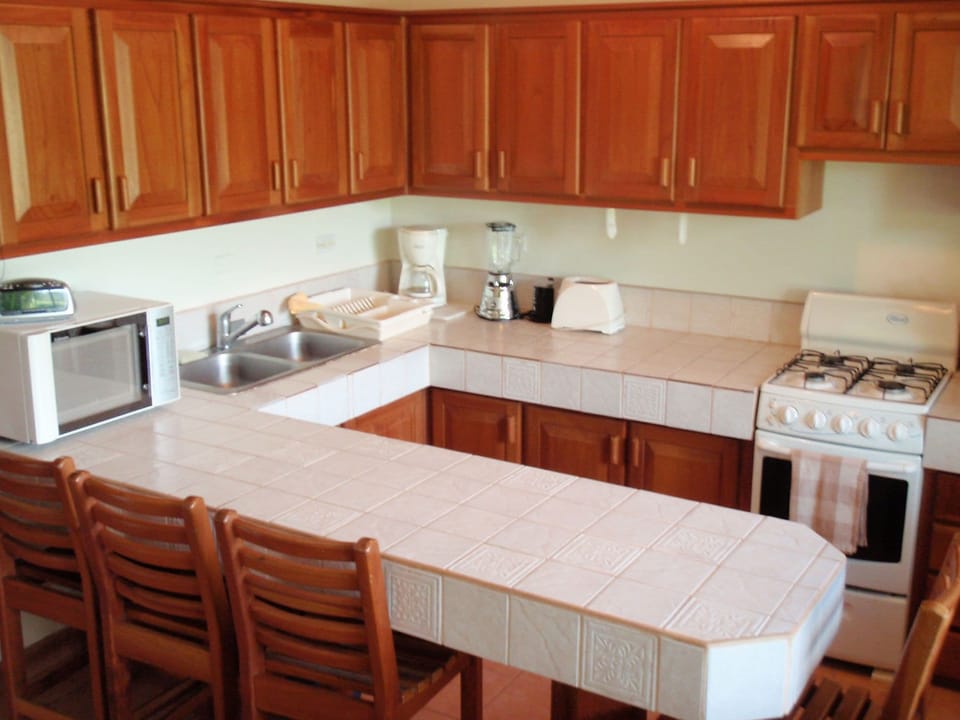 fully equipped kitchen to the 2 story  beach bungalow for up to 5 people