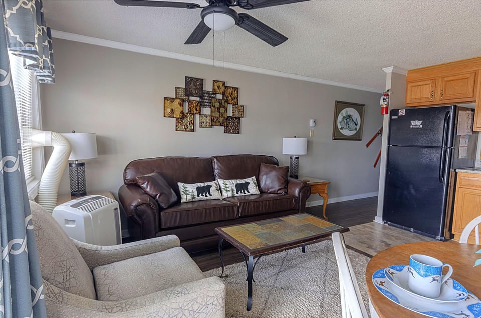 The comfortable living room, with a sleeper sofa, accommodates two additional people.