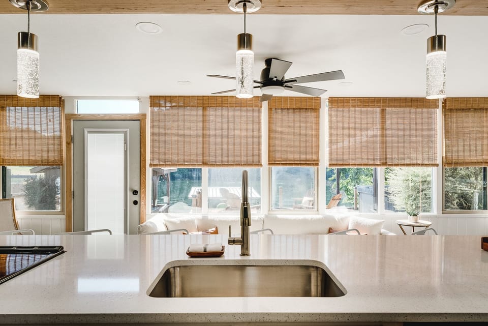 Kitchen is fully equipped with an electric stove with an oven, refrigerator, microwave, and a Keurig