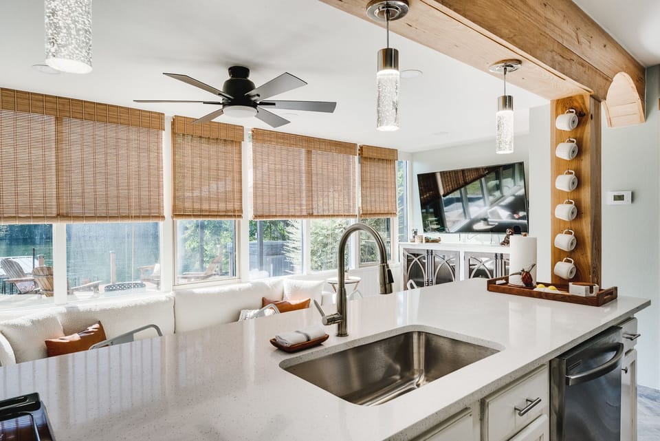 Kitchen is fully equipped with an electric stove with an oven, refrigerator, microwave, and a Keurig