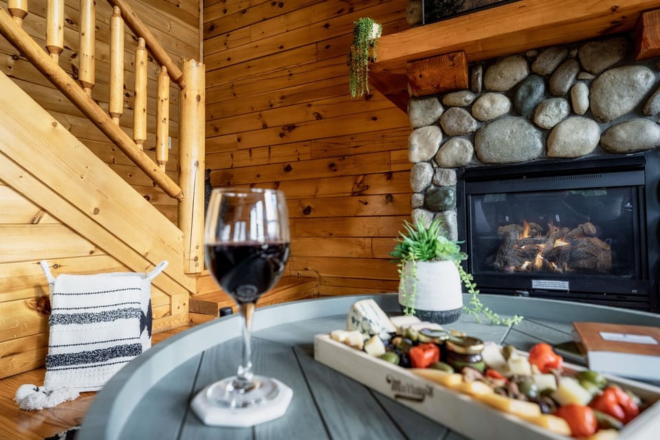 Enjoy a drink in front of the fireplace