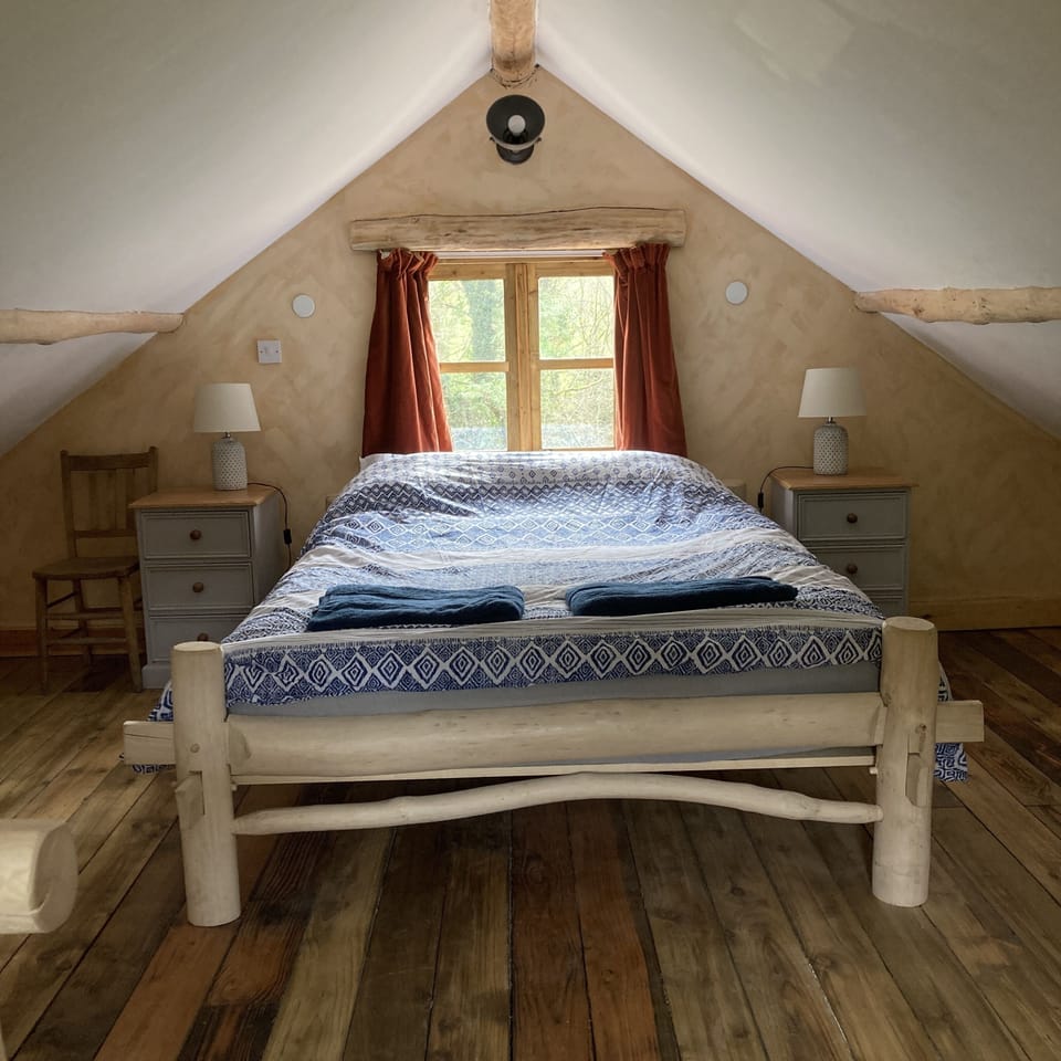 Bedroom with handmade greenwood bed