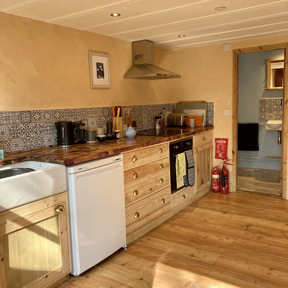 Kitchen, open plan with sitting room