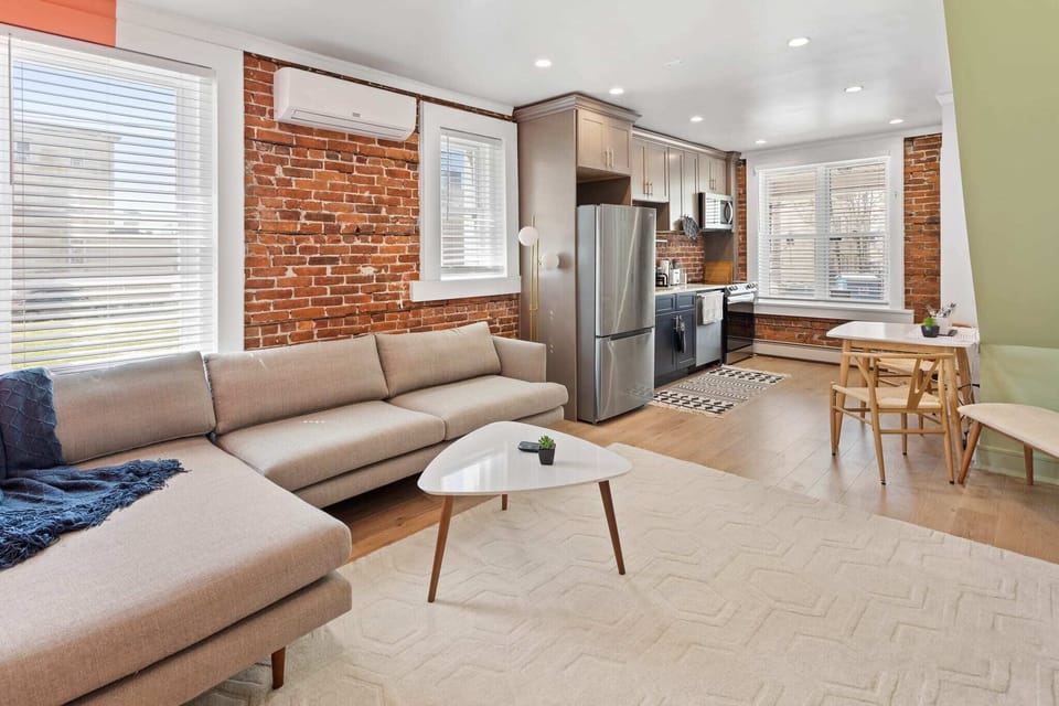 The apartment features bright, open plan living with a cool hipster vibe