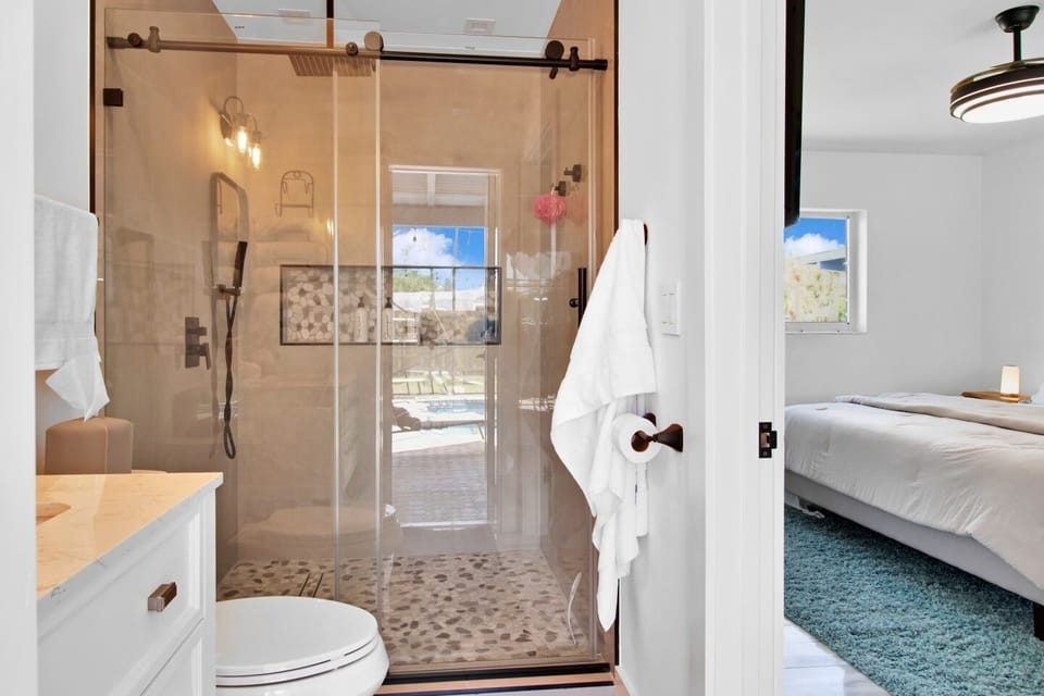 Master bathroom, which leads out to the pool