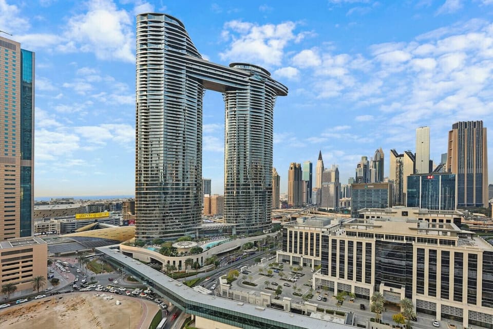Skyline View: Immerse yourself in Dubai`s vibrant cityscape from your stunning balcony retreat!