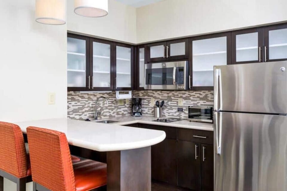 Curb your appetite by cooking a meal in your kitchen.