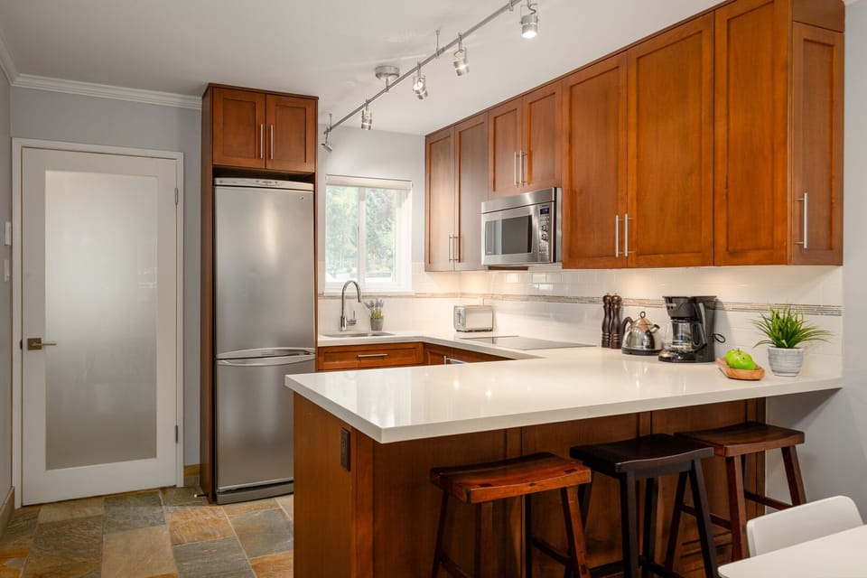 Modern kitchen with breakfast bar perfect for cooking après-ski meals