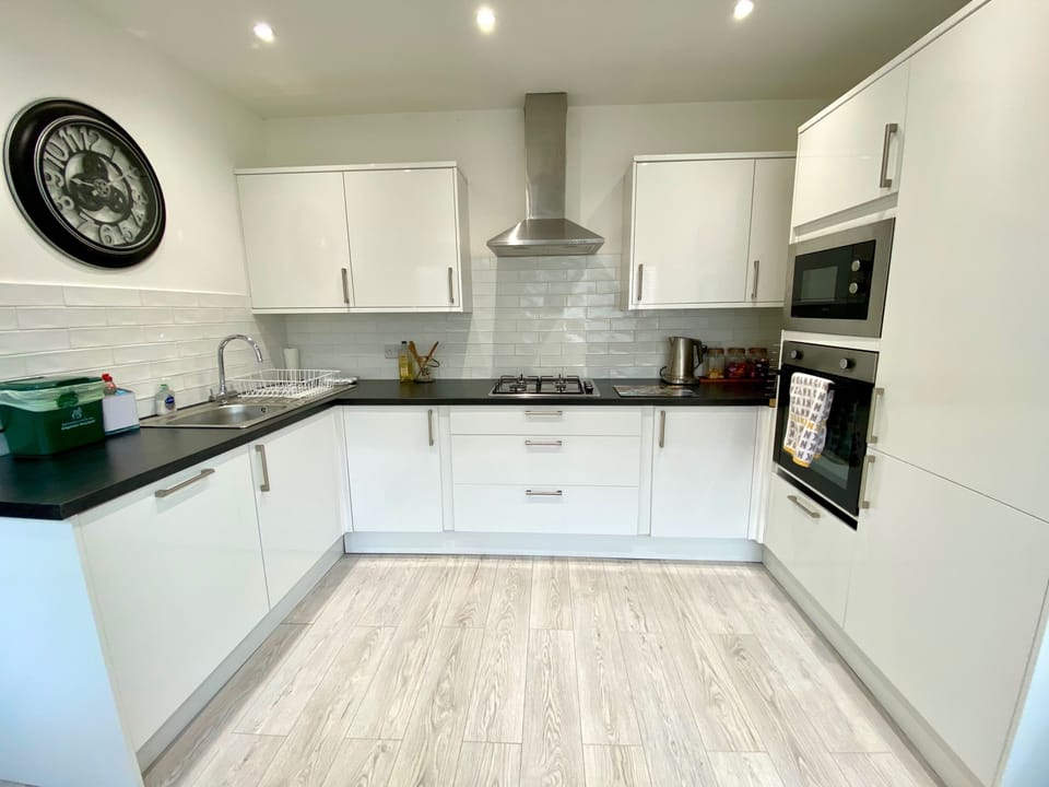 The kitchen has most cooking utensils and pans make a dinner with. 