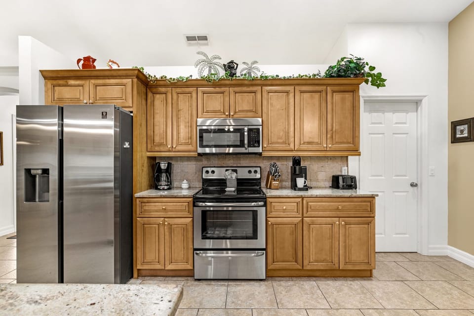 Fully equipped kitchen with stainless steel appliances