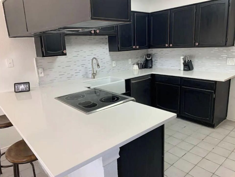 Stylish kitchen offers a perfect blend of functionality and modern design.