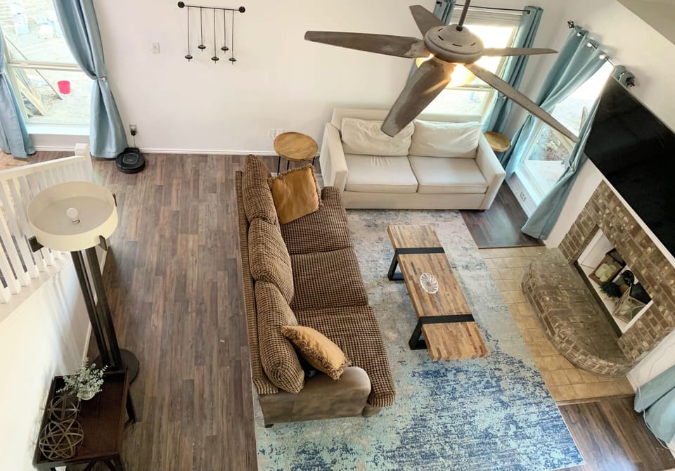 This spacious and  cozy living room invites you to relax and unwind.  