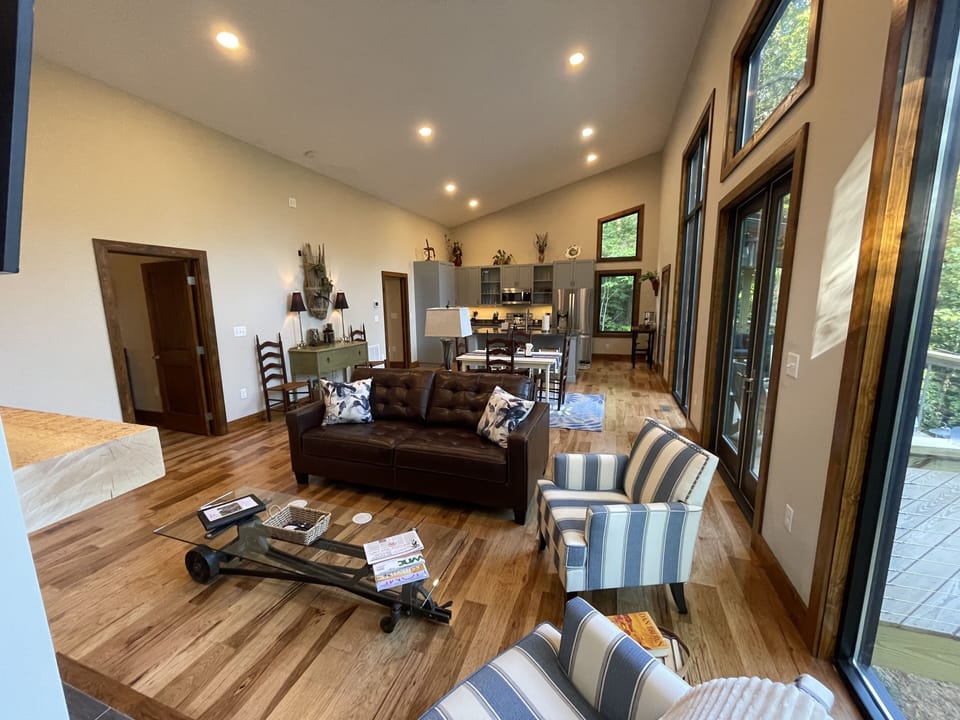 Spacious open living/dining area with 5" Hickory hardwood floors.