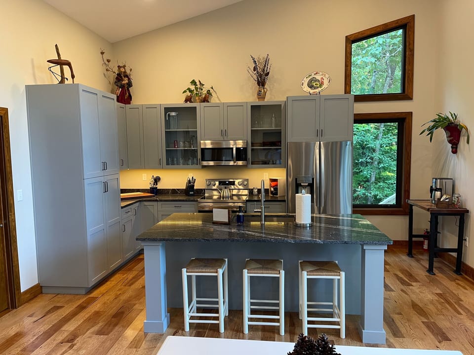 Custom cabinets, LG appliances, cooking accoutrements = comfortable kitchen.