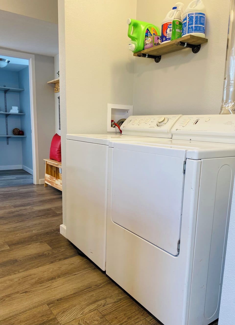 Washer and dryer with laundry detergent included.