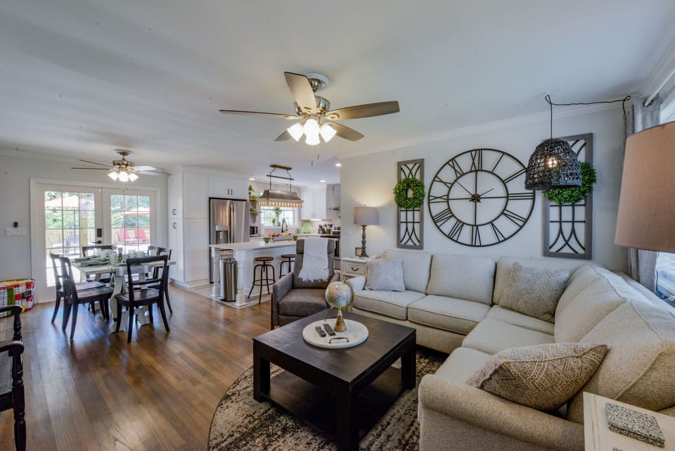 Living Area - The first floor is an open concept. The living room has a comfy couch where everyone can sit and watch tv.