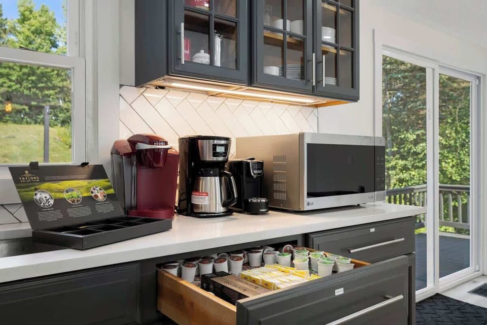 Coffee station with K-cup, Espresso machine, tea, regular coffee, and French Press