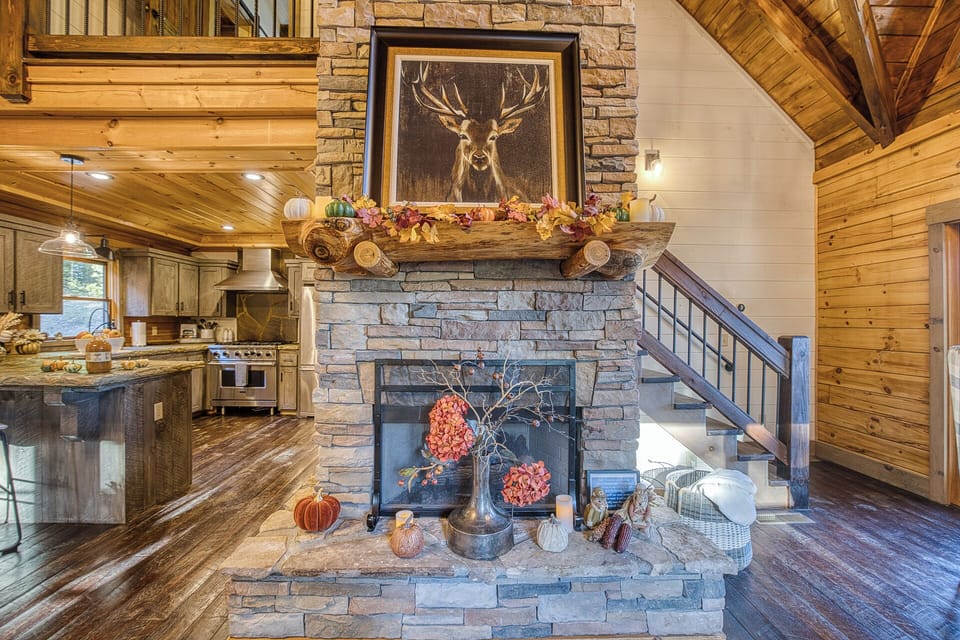 Main-level gas fireplace adds cozy warmth and ambiance at the push of a button.
