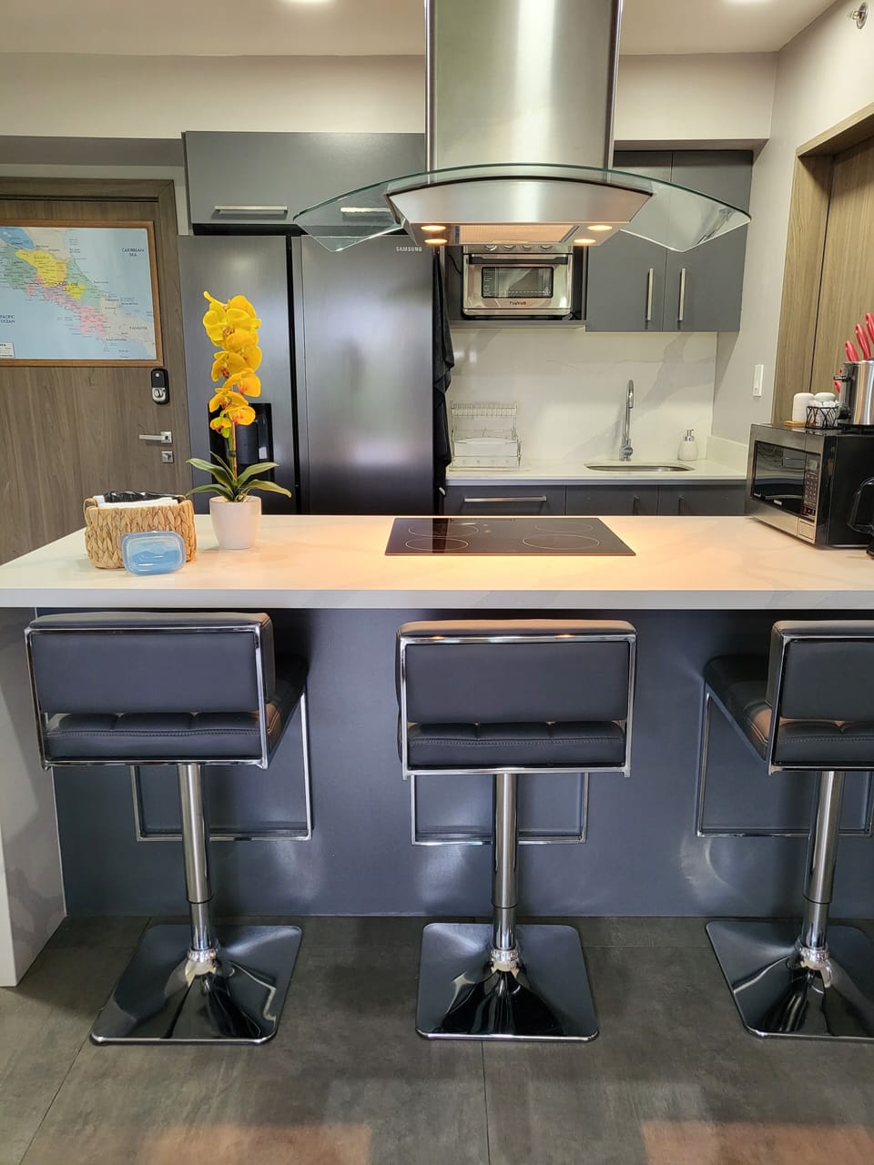 The kitchen offers casual dining and an in-door ice/water refrigerator.