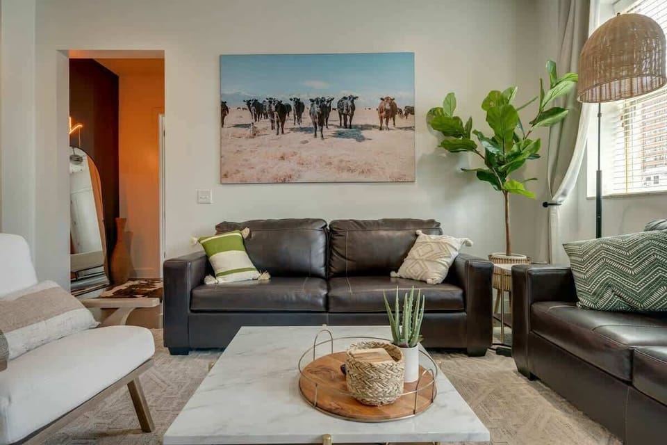 Bright and open living area with smart TV.