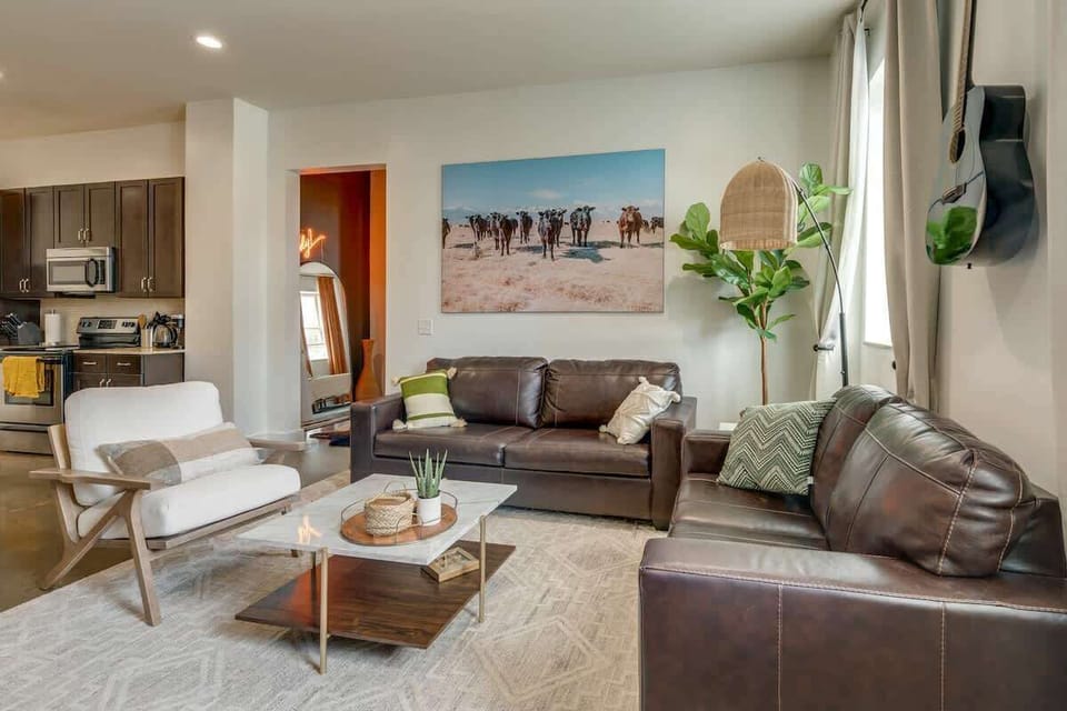 Bright and open living area with smart TV.