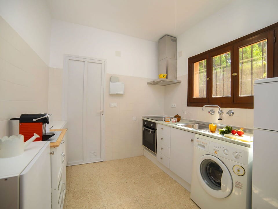 Laundry Room, Cabinetry, Property, Washing Machine, Clothes Dryer, Furniture, Window, Building, Kitchen, Kitchen Stove