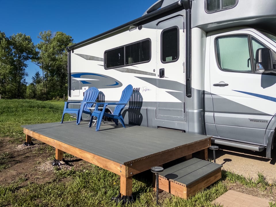 Enjoy the views and the sounds of the birds and the river from the private deck