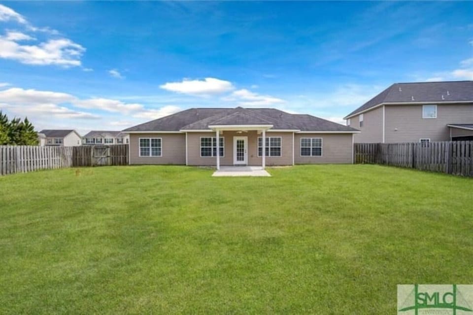 huge backyard is totally fenced in. great for dogs and children. 