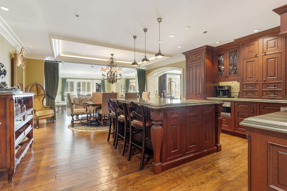 Huge, elegant, chef's kitchen with high-end appliances and finishes throughout