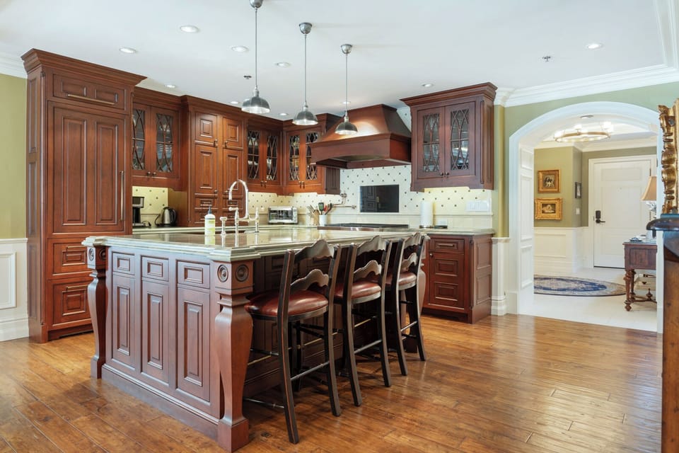 Huge, elegant, chef's kitchen with high-end appliances and finishes throughout
