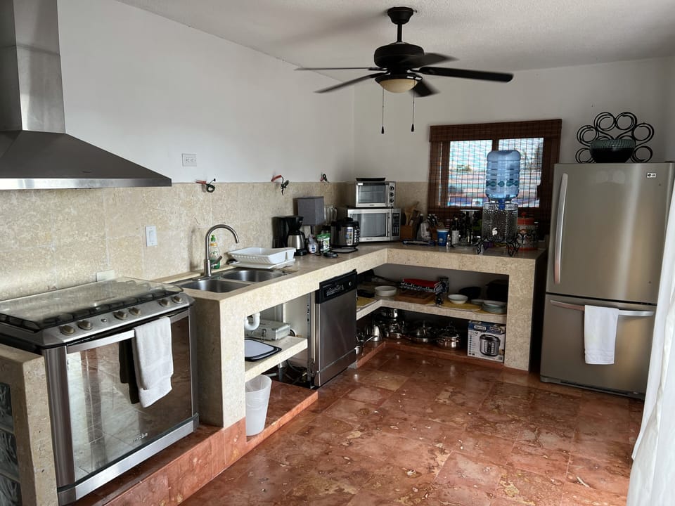 Kitchen area with Gas stove & Oven, dishwasher, full size fridge, microwave