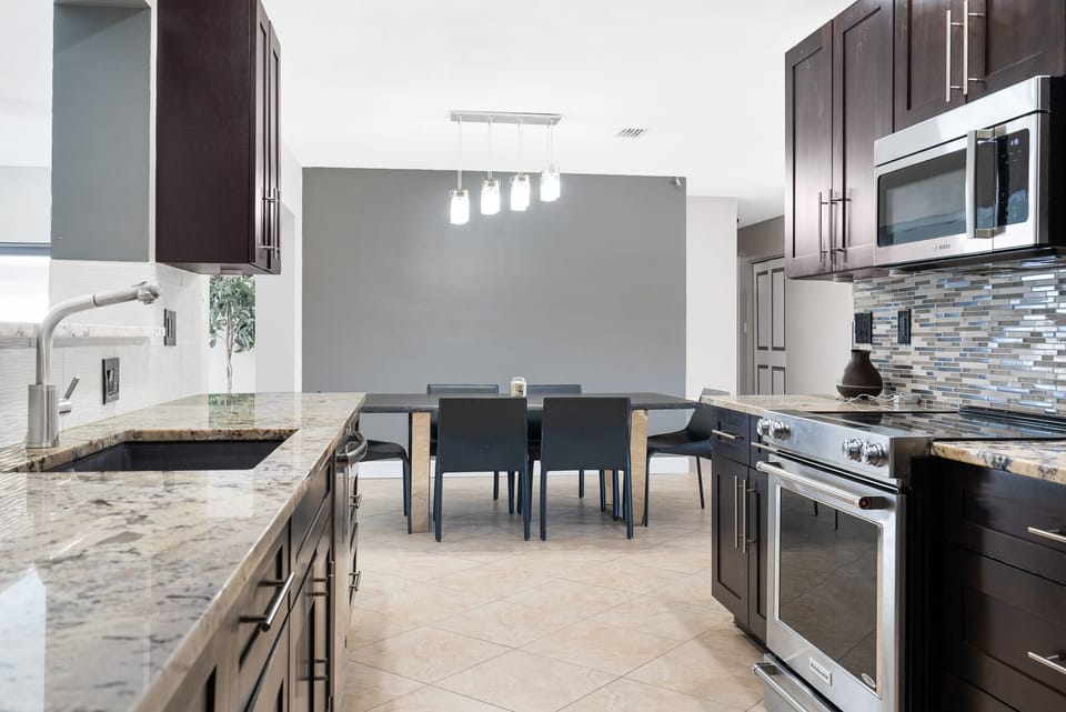Chef's kitchen - stone counters, best appliances, expresso cabinets, etc