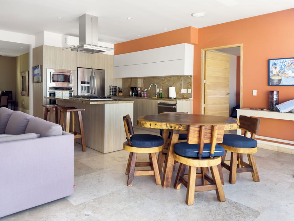 Kitchen, breakfast table, entrance to primary bedroom