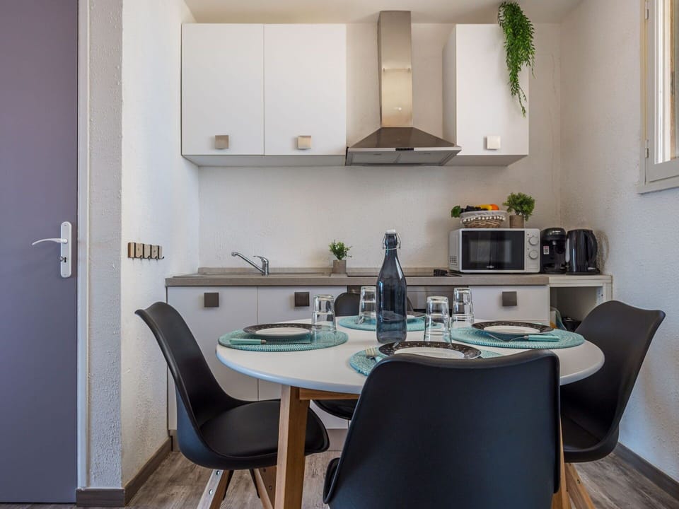 Furniture, Property, Cabinetry, Building, White, Table, Chair, Countertop, Wood, Kitchen