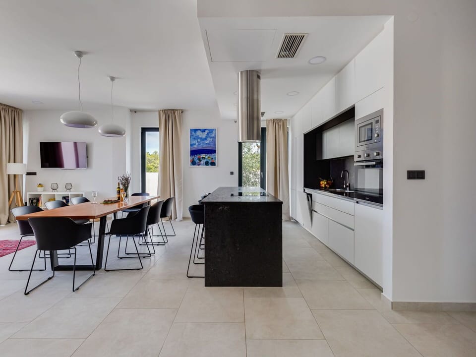 Table, Furniture, Chair, Building, Couch, Cabinetry, Interior Design, Houseplant, Plant, Floor