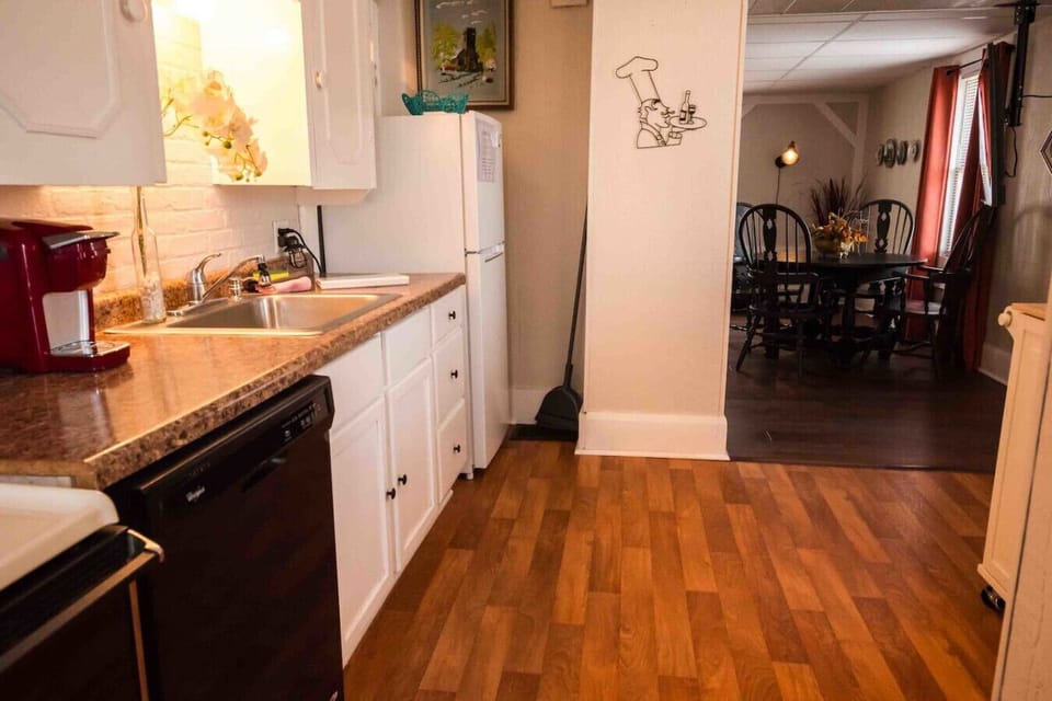 From the kitchen looking into the living room. Not picture to the far right is the bathroom.
