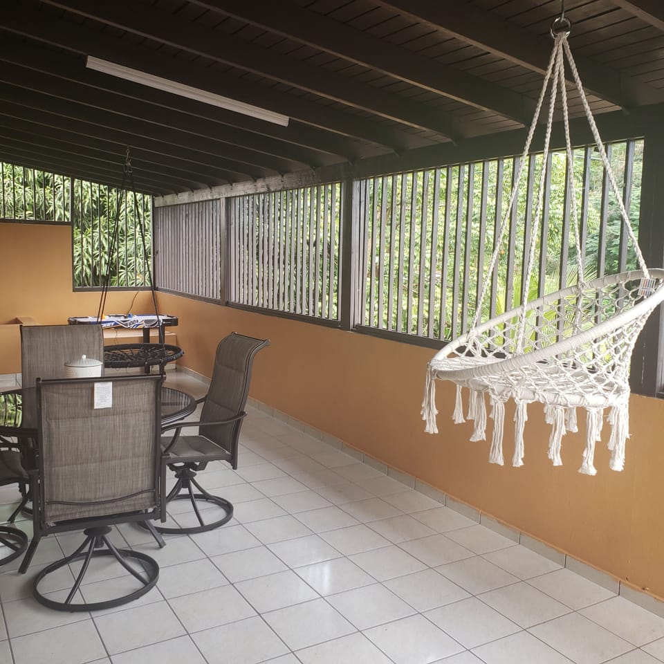 Patio with swings, furniture and games