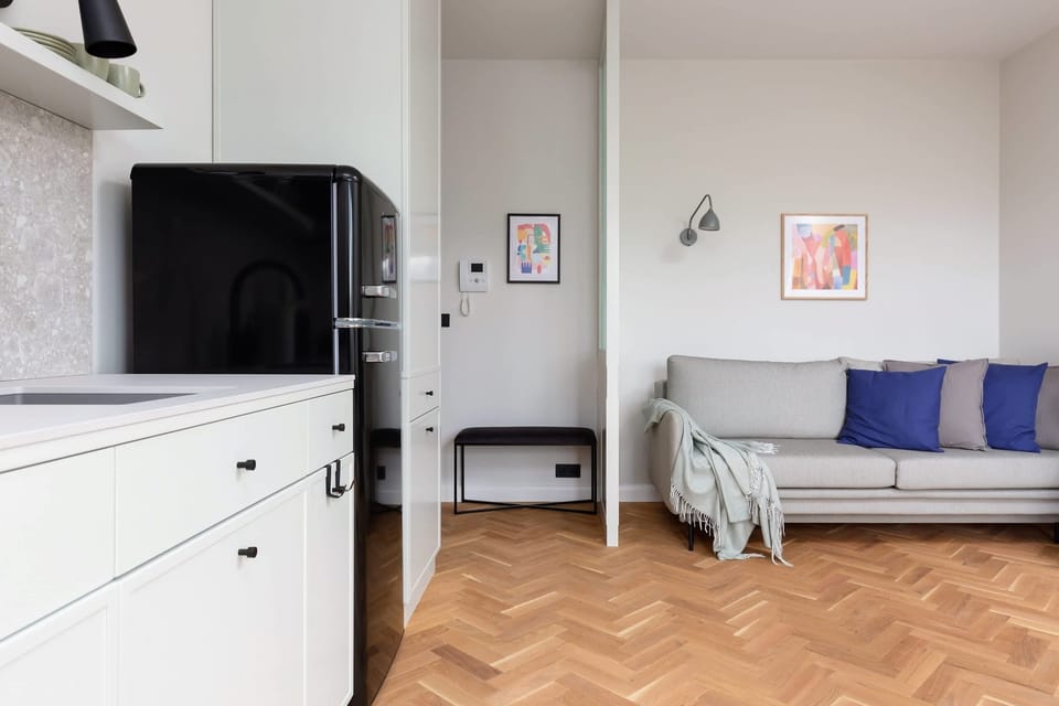 A functional kitchen featuring modern appliances, clean design, and ample storage space.
