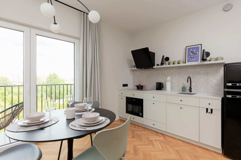 The fully equipped kitchen, perfect for preparing meals during your stay.
