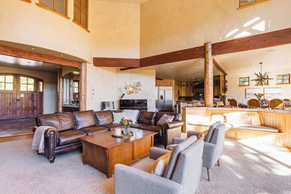 Home's Vibrant Center - 
The great room connects to all areas, with access to a gym, sauna, and massage room for endless comfort and activities.