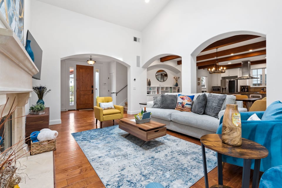 Living room- comfy couch and arm chairs for Netflix and chill.