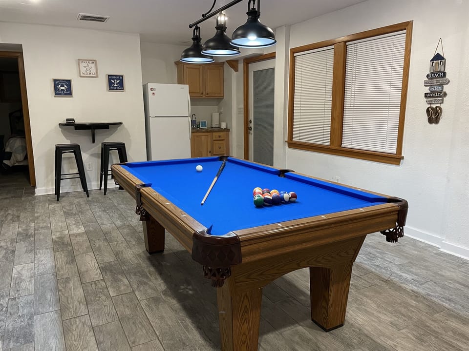 Professionally-installed pool table; Extra fridge and freezer