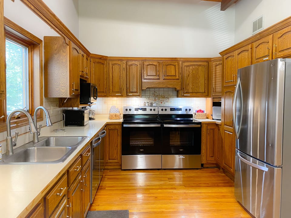 Kitchen--2 sinks, refrigerators, stoves, ovens, microwaves, and dishwashers