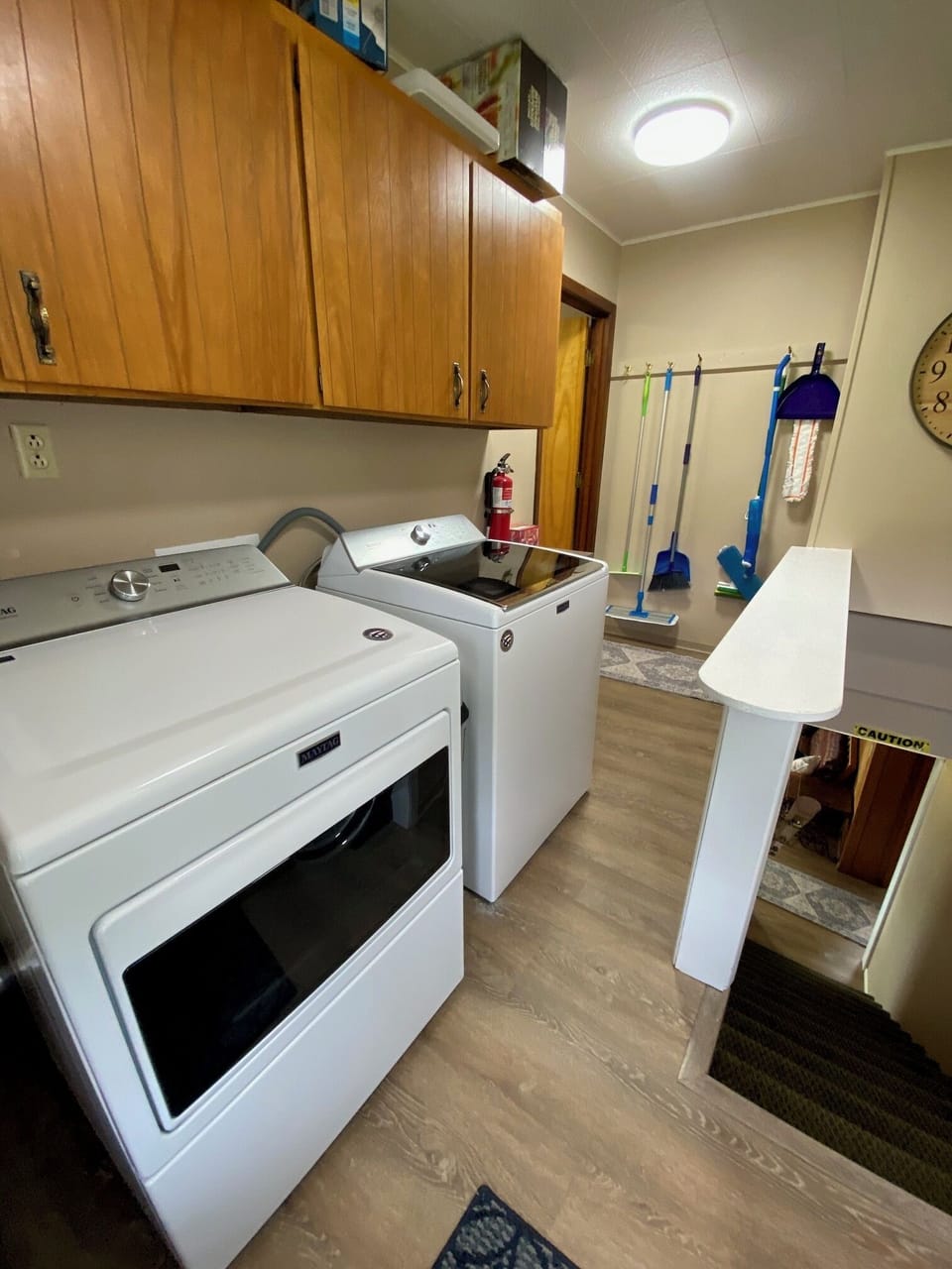 Laundry area, cleaning supplies, extra garbage bags, paper towels, etc.